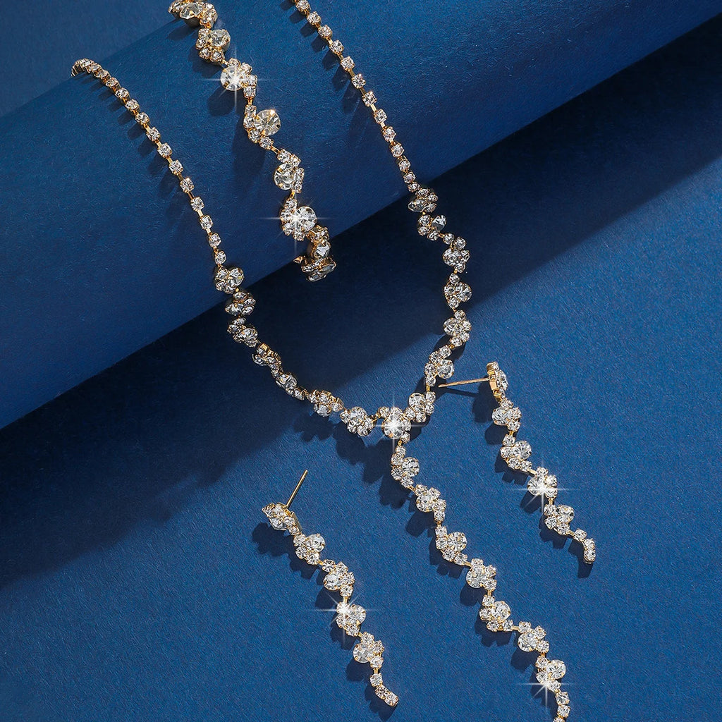 Conjunto Crystal Drop - Colar Gravatinha, Brincos, Pulseira e Anel